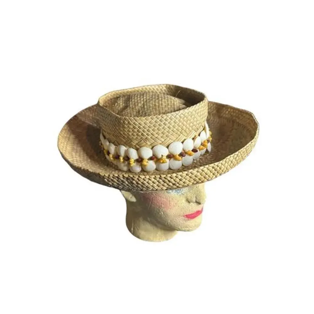 Hat beautiful designed with shells and nicely weaved size large women or men